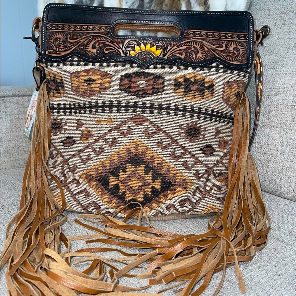 Western fringe shoulder purse with sunflower strap.